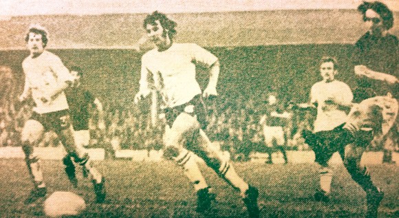 The goal that put Brighton out of the FA Cup: Leatherhead's Chris Kelly (right) hits the 65th minute winner