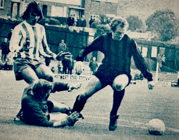 With the halifax goalkeeper on the ground, Beamish loses the ball to Pickering.