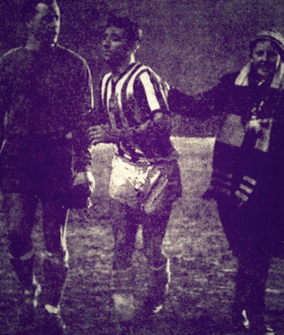 Rotherham's Ironside gets caught up in Brighton's celebrations. Here he is with Curry and a delighted Brighton supporter.