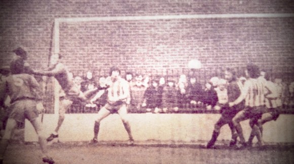 Oops! Powney misses a cross but Gall and O'Sullivan are on hand at the far post to clear.