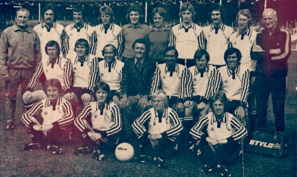 Captain Brian Horton, third from right in the middle row