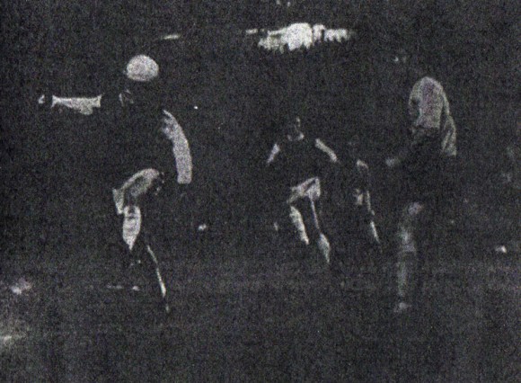 Eddie Spearritt plants his head onto the ball...