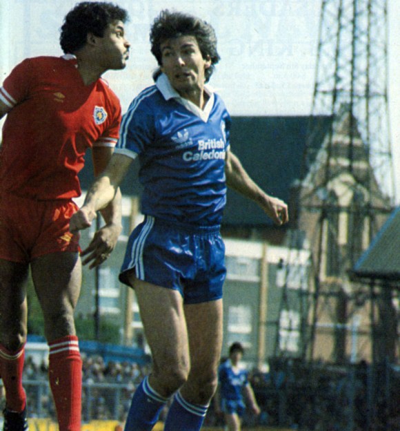 Here's a familiar face for Leicester boss Jock Wallace... Gordon Smith, his former Rangers player, in action against Larry May 