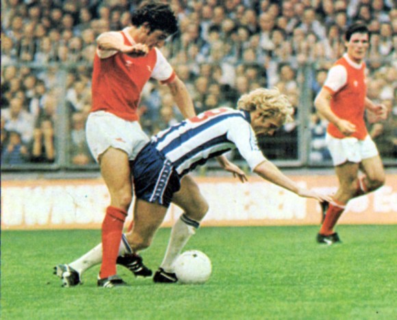 Brian Horton clatters into Teddy Maybank